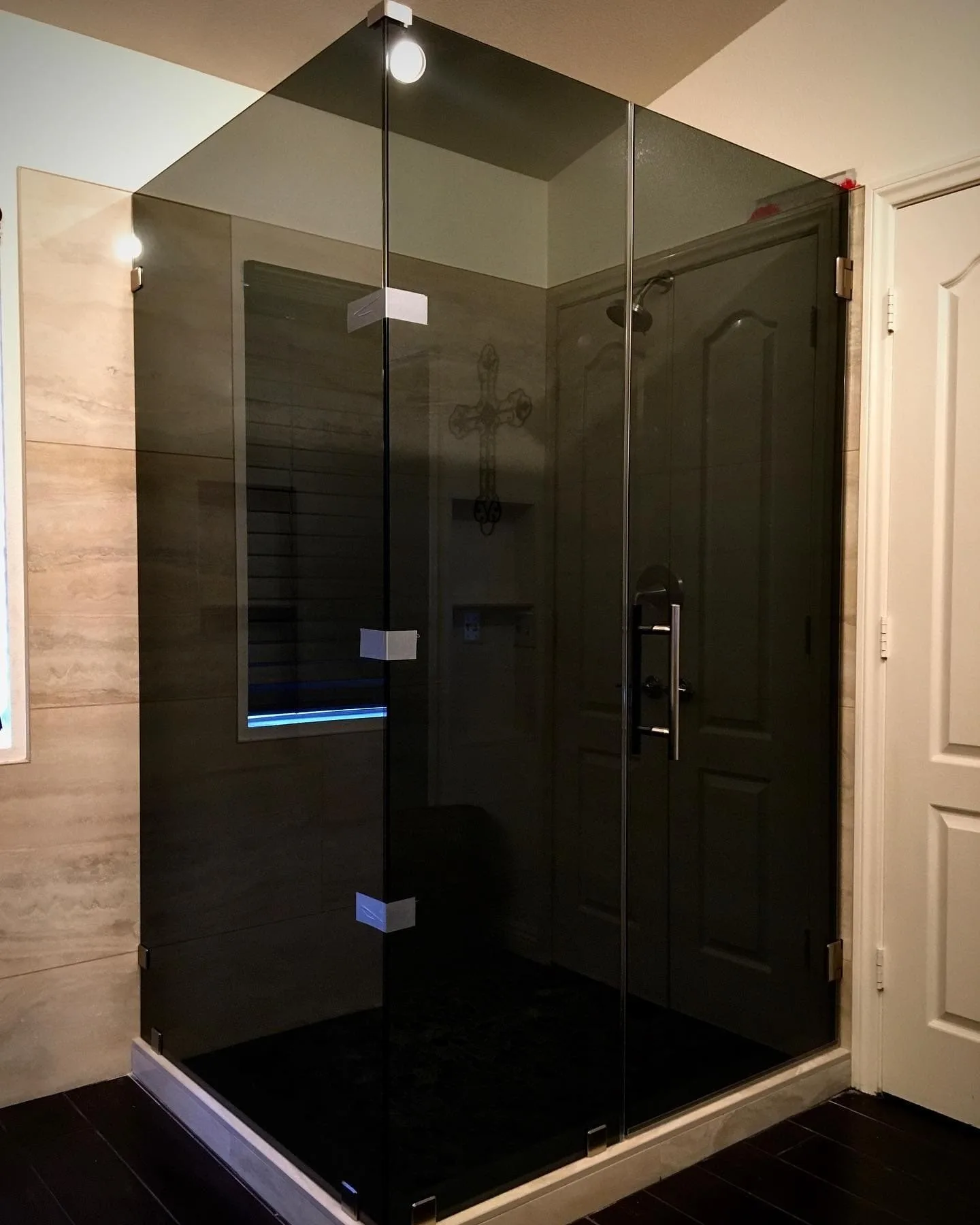 Luxury steam shower with dark tinted glass