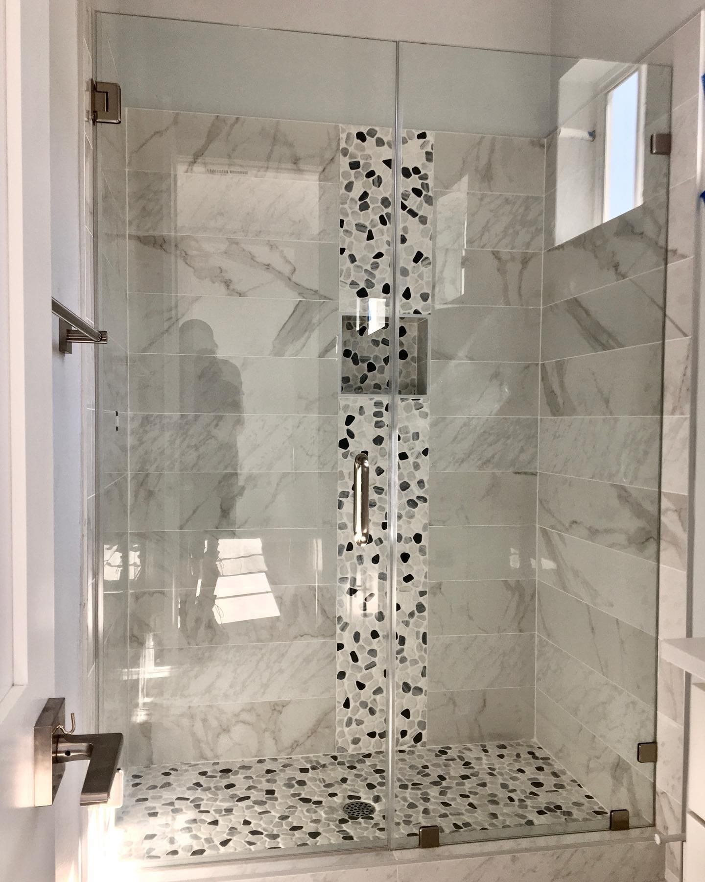 Custom inline shower enclosure with pebble accent — Baja Glass
