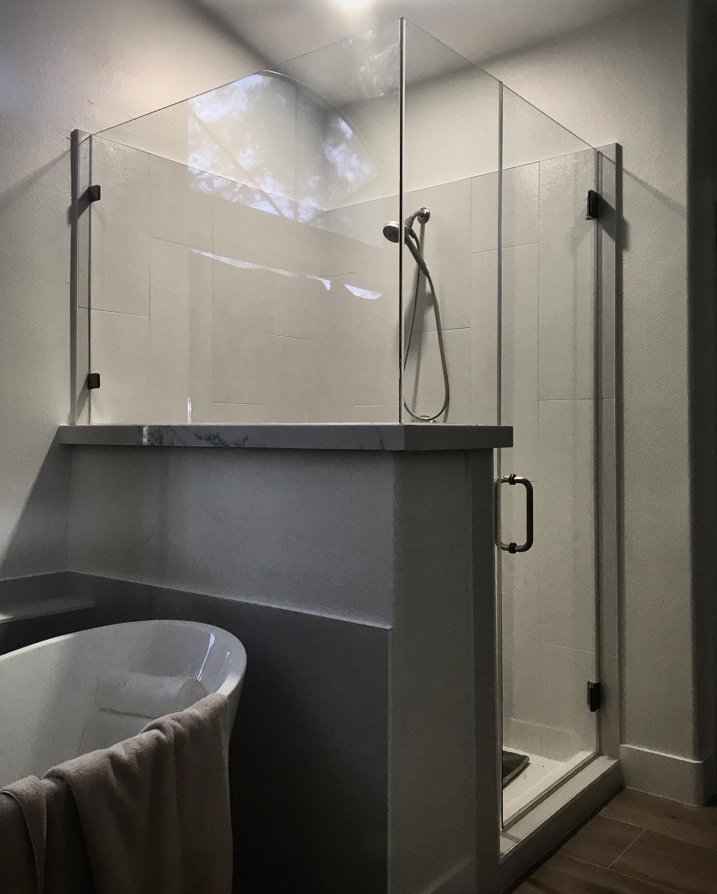 Custom neo-angle shower enclosure — Baja Glass